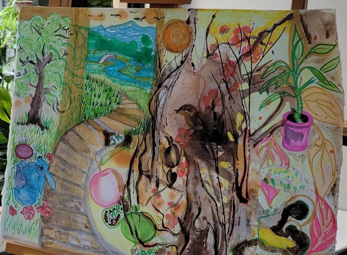 A shared painting of a garden path, tree and apple, made in The Art of Wellness sessions